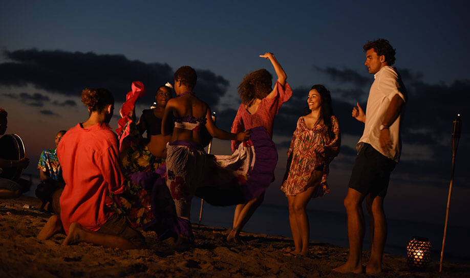 Dancing sega on the beach at night in Mauritius - Veranda Resorts