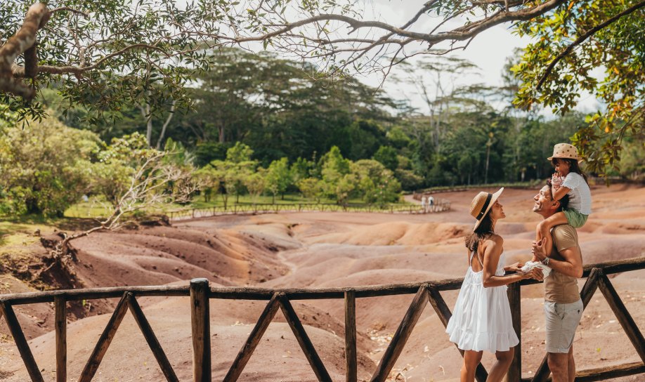 Family visiting the Chamarel Seven Colored Earth Geopark in Mauritius