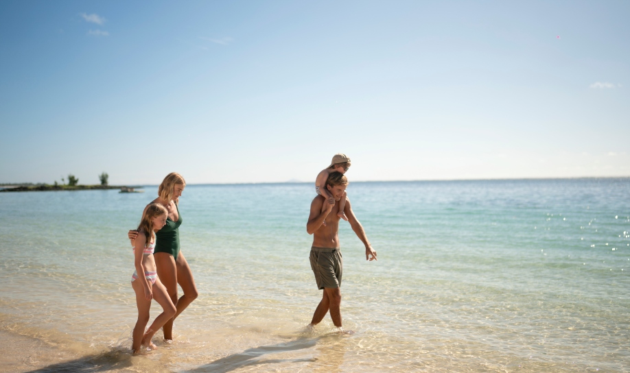 vacation at a family resort with dedicated children’s facilities and a safe island environment