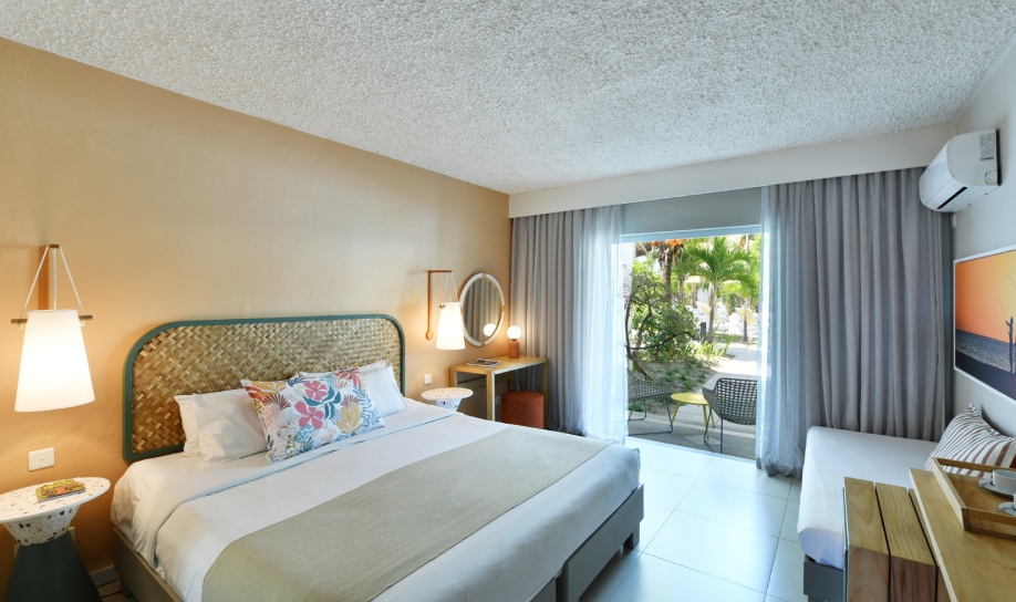 Comfortable guest room at Veranda Palmar Resort in Mauritius