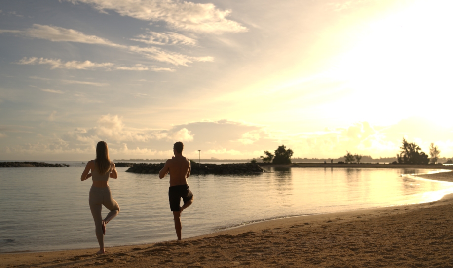 Sunrise yoga session in Mauritius, the perfect way to recharge during summer by the ocean