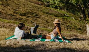couple enjoying a peaceful picnic in the heart of nature