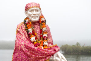 Sai Baba statue at Ganga Talao sacred lake